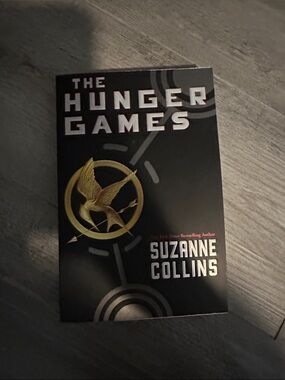 Scholastic The Hunger Games — Black and Gold Paperback